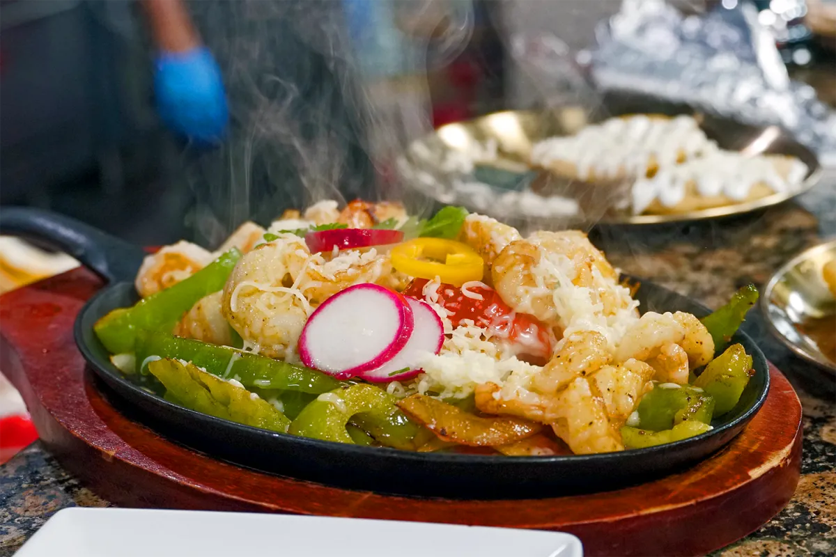 Dahlia’s Mexican Grill signature dishes Aguachile VerdeMolcajete AztecaChilaquiles Fundidos